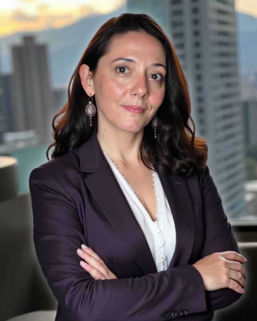 Nayo, arms crossed, city skyline behind her: the operations side of Heal With Nayo